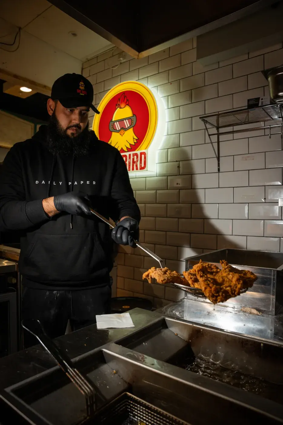 Chef cooking at Hot Bird London